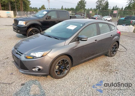2012 Ford Focus Titanium z USA, uszkodzony, nr VIN 1FAHP3N28CL210557